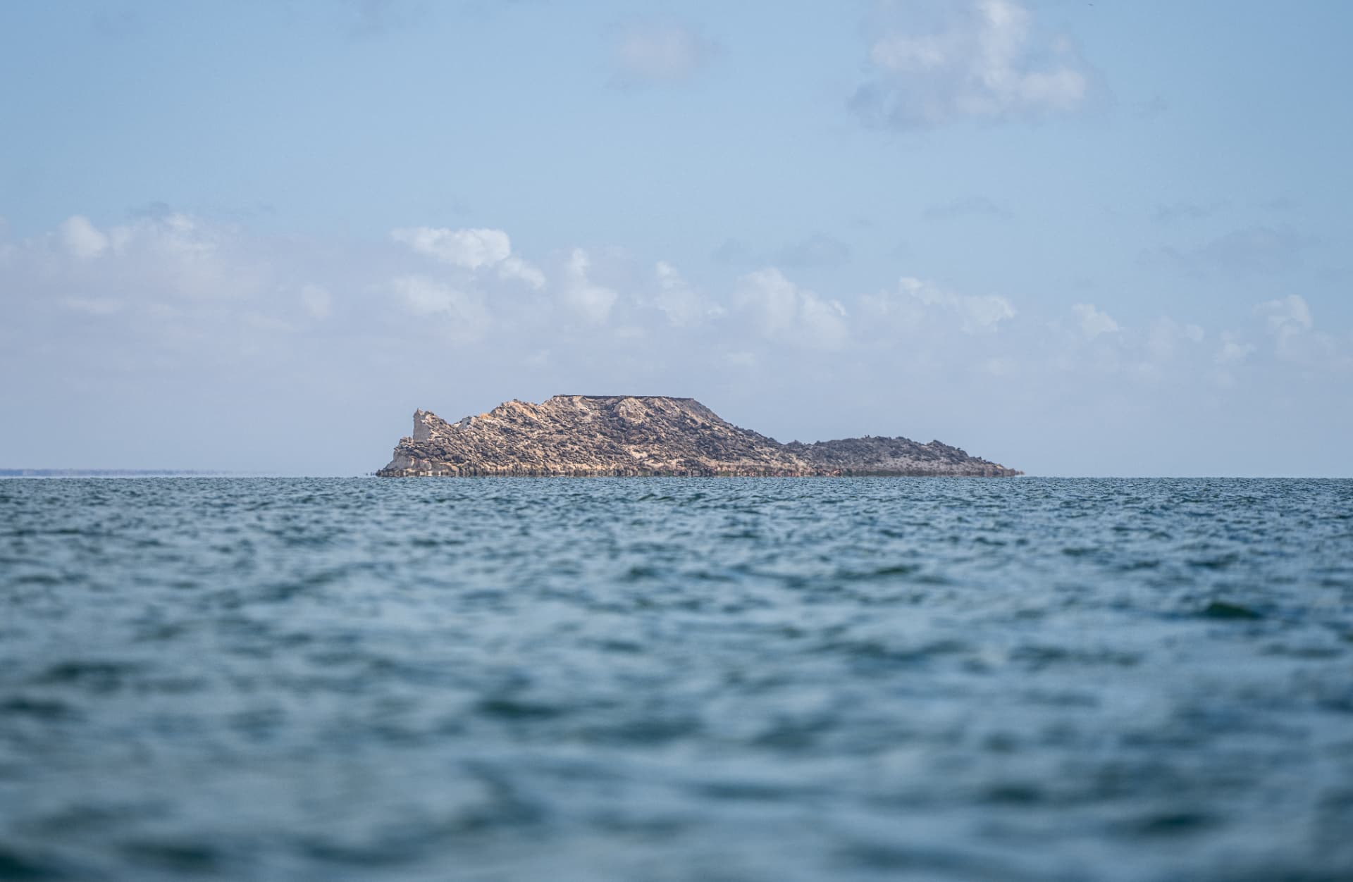 Rocky island off the Dakhla bay under a clear sky